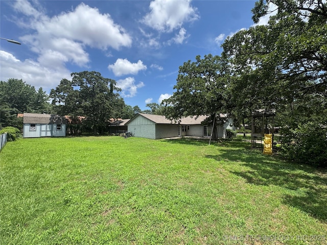 1516 Timber Ridge Dr, Cleveland, OK 74020 - view of yard with a shed