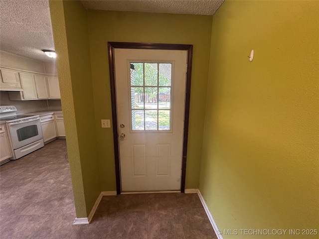 1516 Timber Ridge Dr, Cleveland, OK 74020 - entryway featuring a textured ceiling