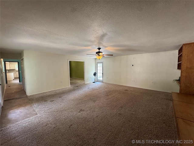 1516 Timber Ridge Dr, Cleveland, OK 74020 - unfurnished living room with ceiling fan, carpet floors, and a textured ceiling