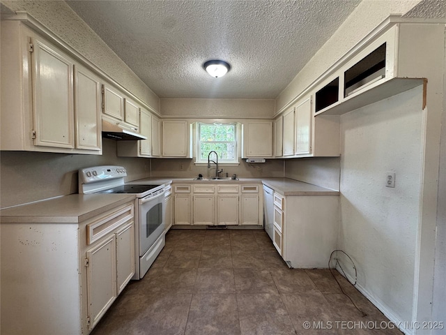 1516 Timber Ridge Dr, Cleveland, OK 74020 - kitchen with white appliances, under cabinet range hood, a textured ceiling, and light countertops