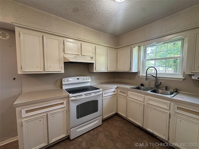 1516 Timber Ridge Dr, Cleveland, OK 74020 - kitchen featuring white range with electric cooktop, under cabinet range hood, light countertops, and a textured ceiling