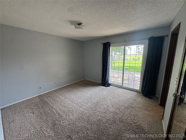 1516 Timber Ridge Dr, Cleveland, OK 74020 - empty room featuring carpet and a textured ceiling