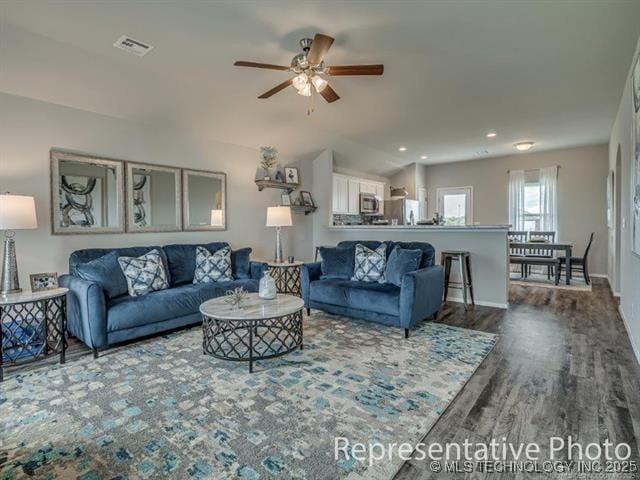 1105 W Lawton Rd, Claremore, OK 74019 - living room featuring ceiling fan, dark wood-style floors, lofted ceiling, and recessed lighting