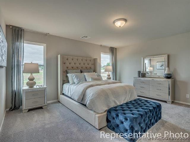 1105 W Lawton Rd, Claremore, OK 74019 - bedroom featuring light colored carpet and baseboards