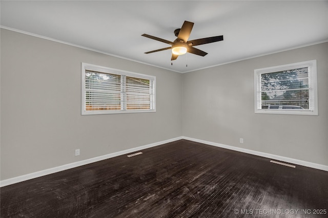 5941 S Utica Ave, Tulsa, OK 74105 - empty room featuring a ceiling fan, crown molding, and dark wood-type flooring