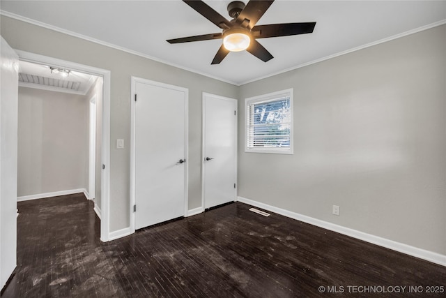 5941 S Utica Ave, Tulsa, OK 74105 - unfurnished bedroom featuring crown molding, wood finished floors, and a ceiling fan