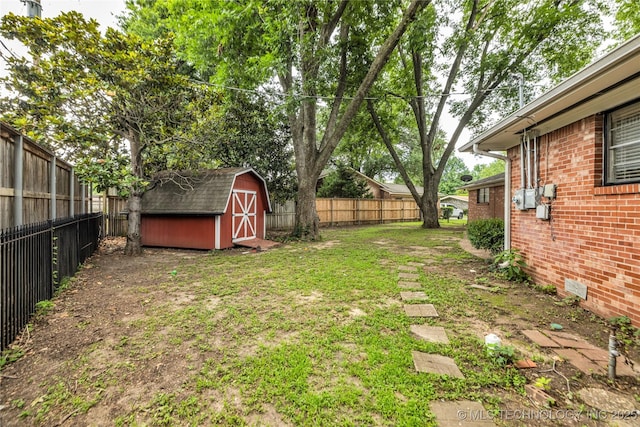 5941 S Utica Ave, Tulsa, OK 74105 - fenced backyard featuring a storage unit