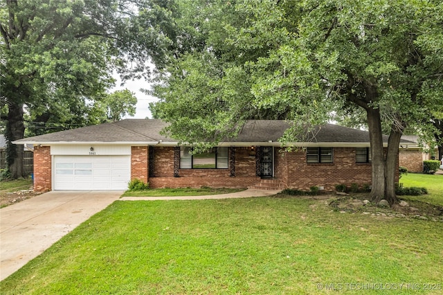 5941 S Utica Ave, Tulsa, OK 74105 - view of front facade featuring an attached garage, driveway, brick siding, and a front yard