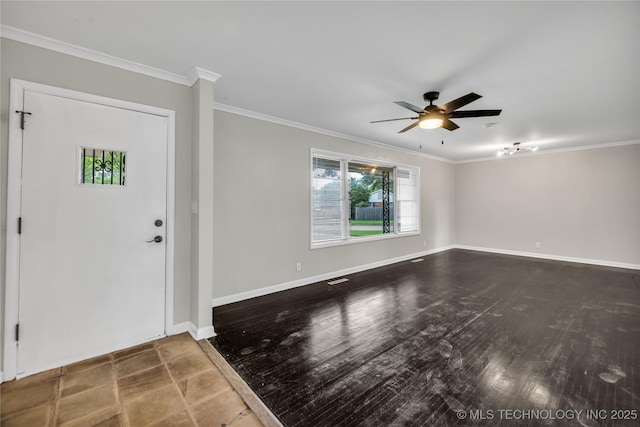 5941 S Utica Ave, Tulsa, OK 74105 - foyer entrance with a ceiling fan, crown molding, and wood finished floors