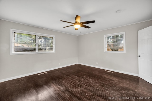 5941 S Utica Ave, Tulsa, OK 74105 - unfurnished room with ceiling fan, ornamental molding, wood finished floors, and a smoke detector