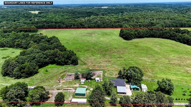 6850 E County Road 553, Kansas, OK 74347 - aerial view of property and surrounding area featuring a forest and property parcel outlined