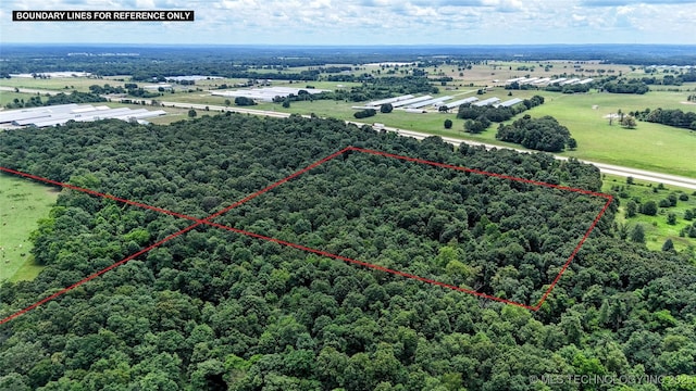 6850 E County Road 553, Kansas, OK 74347 - aerial view of property and surrounding area featuring property boundaries highlighted and a forest