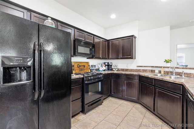23204 S Jewell Dr, Claremore, OK 74019 - kitchen featuring black appliances, light tile patterned floors, dark brown cabinetry, light countertops, and recessed lighting