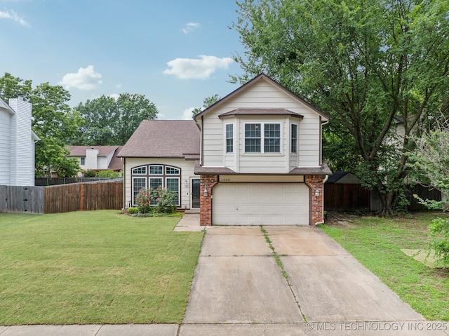1508 S Kalanchoe Ave, Broken Arrow, OK 74012 - view of front of house with a garage, driveway, and brick siding