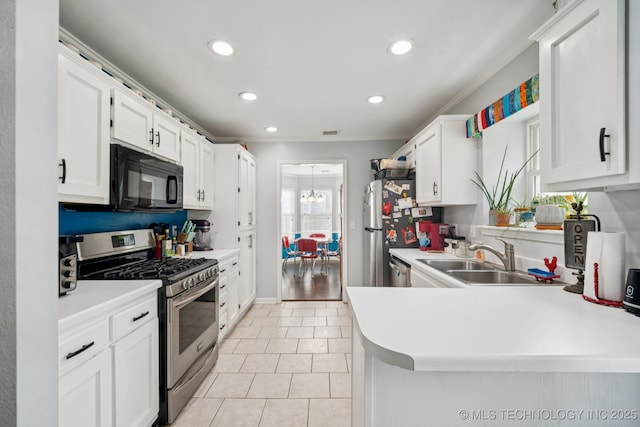1508 S Kalanchoe Ave, Broken Arrow, OK 74012 - kitchen featuring stainless steel appliances, light tile patterned floors, recessed lighting, light countertops, and white cabinets