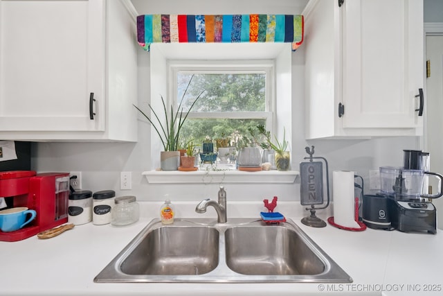 1508 S Kalanchoe Ave, Broken Arrow, OK 74012 - kitchen with light countertops and white cabinets