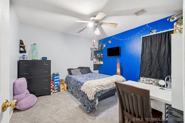 1508 S Kalanchoe Ave, Broken Arrow, OK 74012 - bedroom featuring a textured ceiling, carpet, and a ceiling fan
