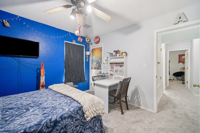 1508 S Kalanchoe Ave, Broken Arrow, OK 74012 - carpeted bedroom with a textured ceiling and a ceiling fan