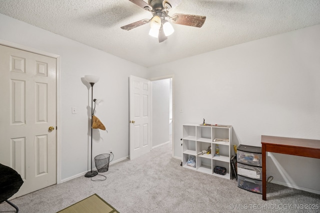 1508 S Kalanchoe Ave, Broken Arrow, OK 74012 - miscellaneous room with carpet flooring, ceiling fan, and a textured ceiling