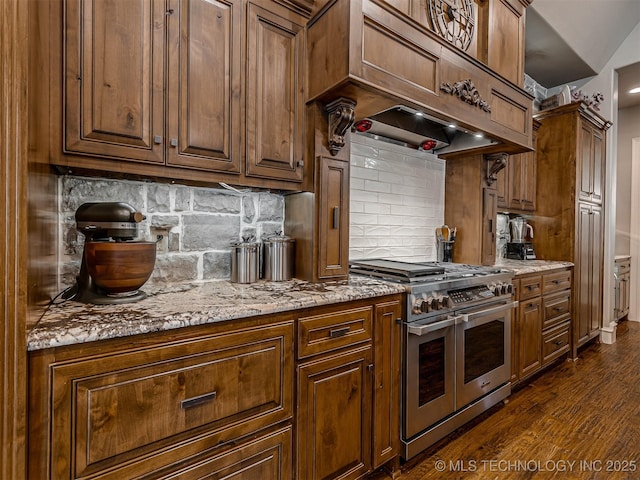 10741 S 93rd E Ave, Tulsa, OK 74133 - kitchen with range with two ovens, decorative backsplash, dark wood-style flooring, and light stone countertops