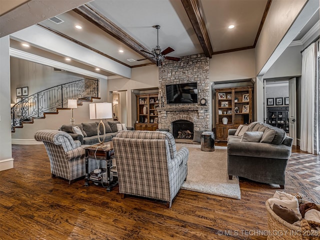 10741 S 93rd E Ave, Tulsa, OK 74133 - living room with ceiling fan, wood finished floors, beam ceiling, a fireplace, and crown molding