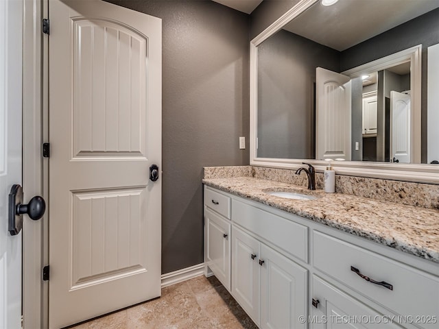 10741 S 93rd E Ave, Tulsa, OK 74133 - bathroom featuring vanity and stone finish floors