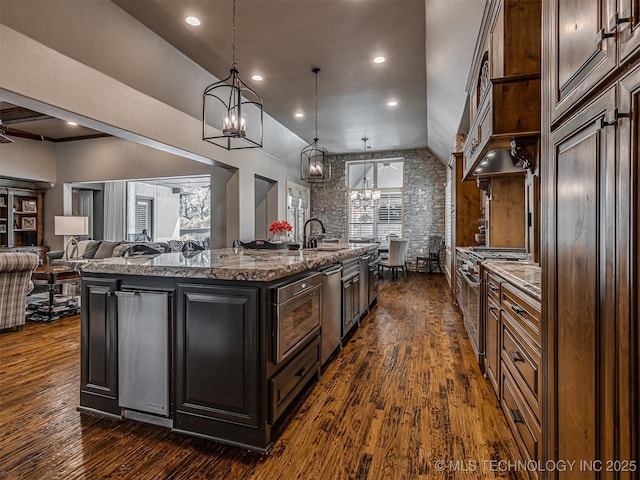 10741 S 93rd E Ave, Tulsa, OK 74133 - kitchen featuring high quality appliances, a chandelier, a center island with sink, dark wood-style floors, and recessed lighting