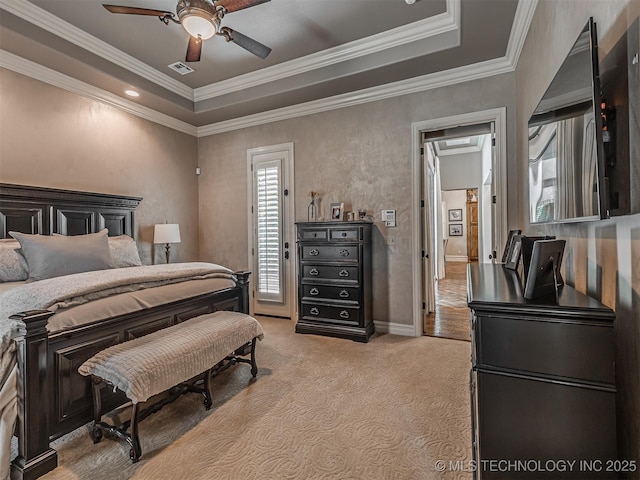 10741 S 93rd E Ave, Tulsa, OK 74133 - bedroom featuring a raised ceiling, light colored carpet, ornamental molding, and ceiling fan