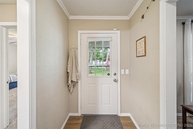 16 Big Bluff St, Pryor, OK 74361 - doorway to outside featuring ornamental molding and dark wood-type flooring
