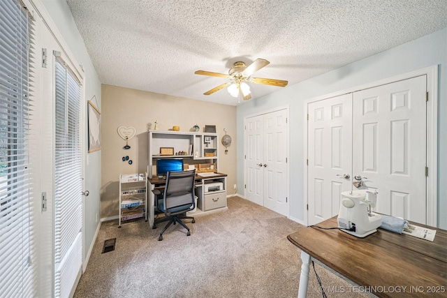 16 Big Bluff St, Pryor, OK 74361 - carpeted home office with a ceiling fan, a textured ceiling, and plenty of natural light