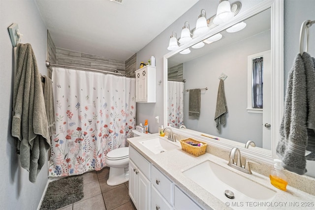 16 Big Bluff St, Pryor, OK 74361 - bathroom with tile patterned floors, double vanity, and a shower with curtain