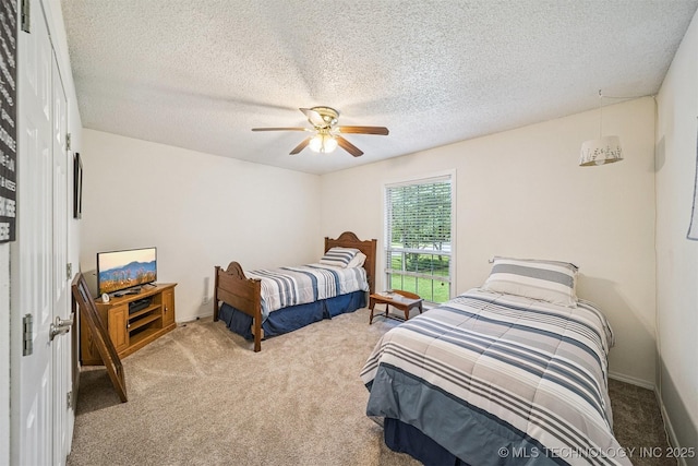 16 Big Bluff St, Pryor, OK 74361 - carpeted bedroom with ceiling fan and a textured ceiling