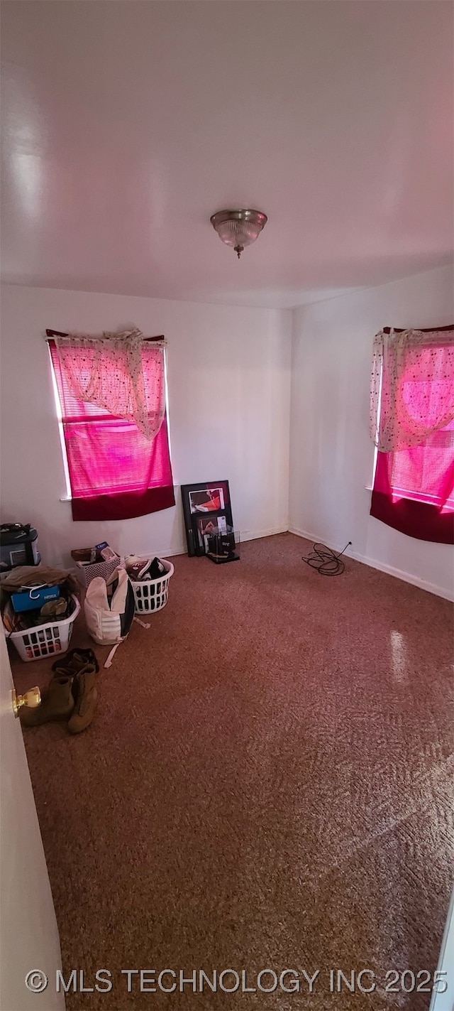 1763 Bryan St, Westville, OK 74965 - unfurnished living room featuring carpet floors