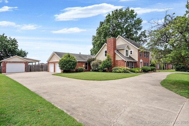 3316 E 88th St, Tulsa, OK 74137 - traditional-style house with brick siding, a chimney, and a detached garage