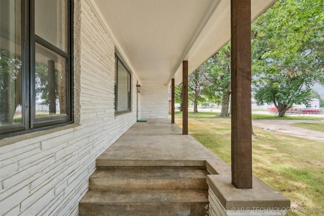 215 S Elliott St, Pryor, OK 74361 - porch with a yard