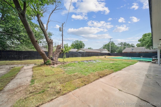215 S Elliott St, Pryor, OK 74361 - fenced backyard featuring a patio area