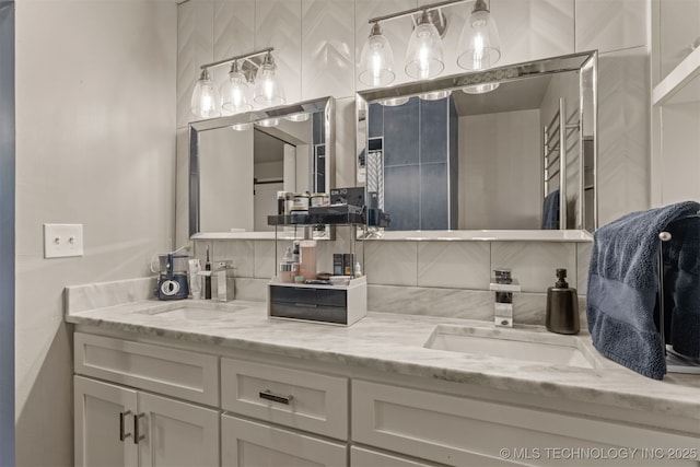 5951 E 25th Pl S, Tulsa, OK 74114 - full bath with double vanity and tasteful backsplash
