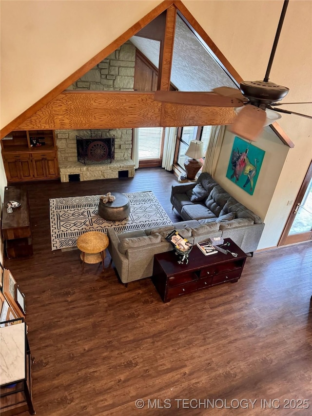 8448 S Florence Ave, Tulsa, OK 74137 - living room featuring wood finished floors, a high ceiling, and ceiling fan