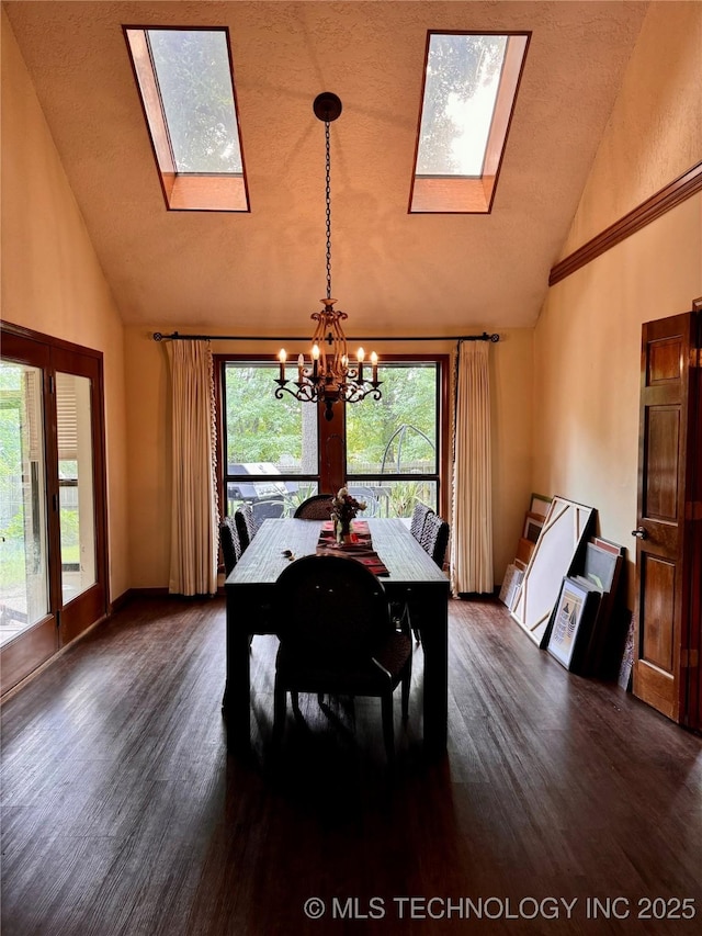 8448 S Florence Ave, Tulsa, OK 74137 - dining area with a skylight, high vaulted ceiling, a chandelier, and dark wood-style flooring