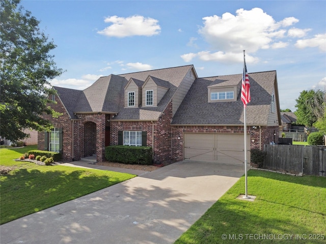13907 E 90th St, Owasso, OK 74055 - view of front of property with brick siding, roof with shingles, concrete driveway, and an attached garage