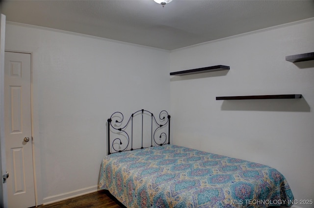 4545 S 30th W Ave, Tulsa, OK 74107 - bedroom with ornamental molding and dark wood-style floors