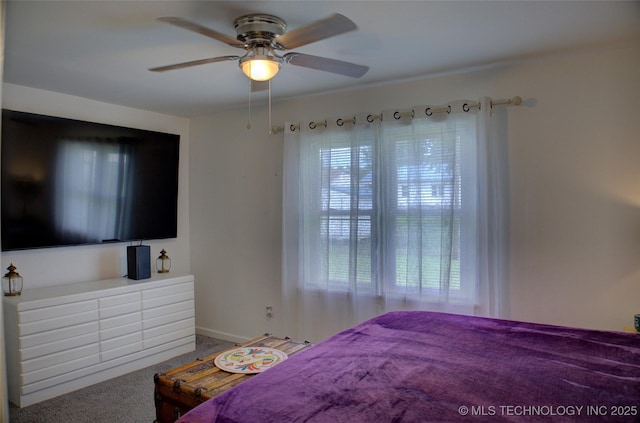 4545 S 30th W Ave, Tulsa, OK 74107 - carpeted bedroom with ceiling fan and baseboards