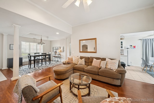 8931 E 62nd Pl, Tulsa, OK 74133 - living room featuring decorative columns, light wood finished floors, crown molding, ceiling fan, and recessed lighting