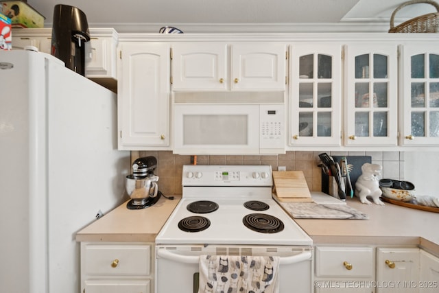 8931 E 62nd Pl, Tulsa, OK 74133 - kitchen with white appliances, light countertops, decorative backsplash, and white cabinets
