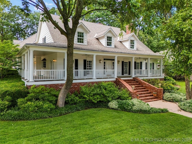 8710 S Vandalia Ave, Tulsa, OK 74137 - cape cod home with covered porch, a front lawn, stairs, and roof with shingles