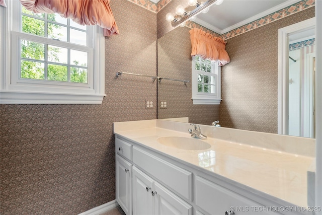 8710 S Vandalia Ave, Tulsa, OK 74137 - bathroom with vanity and ornamental molding