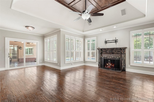 10150 S Maplewood Ave, Tulsa, OK 74137 - unfurnished living room featuring ceiling fan, a raised ceiling, wood finished floors, a lit fireplace, and crown molding