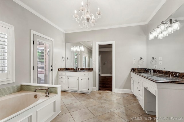 10150 S Maplewood Ave, Tulsa, OK 74137 - full bathroom featuring a chandelier, two vanities, tile patterned floors, a garden tub, and ornamental molding