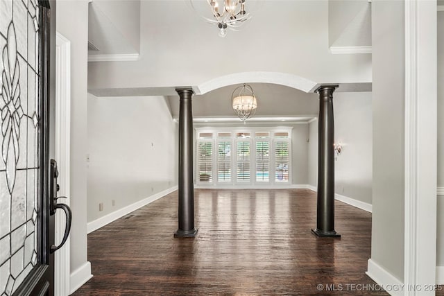 10150 S Maplewood Ave, Tulsa, OK 74137 - entryway with wood finished floors, crown molding, a chandelier, and arched walkways