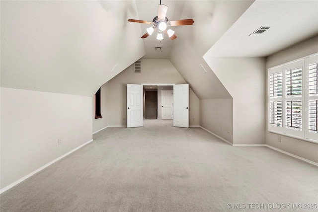 10150 S Maplewood Ave, Tulsa, OK 74137 - additional living space featuring light carpet, a ceiling fan, and vaulted ceiling